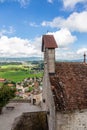 View of the valley, alpine mountains and cloudy sky from Castle Gruyeres, Switzerland Royalty Free Stock Photo