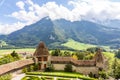 View of the valley, alpine mountains and cloudy sky from Castle Gruyeres, Switzerland Royalty Free Stock Photo