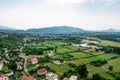 View of the valley with Lead Mosque without minarets from the hill with Rozafa castle Albania. Flat summer landscape with a