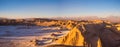 View of the Valley of the Moon in San Pedro de Atacama at sunset. In the background the volcano Licancabur and the Juriques Royalty Free Stock Photo