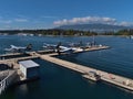 View of Vancouver Harbour Flight Centre with mooring seaplanes of Canadian airline Harbour Air and Stanley Park.