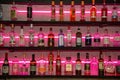 View of various liquor bottles on a bar shelf. Royalty Free Stock Photo