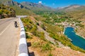 View on Vathi bay, lowland and scooter standing on the roadside Royalty Free Stock Photo