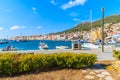 View of Vathy port with typical fishing boats and colourful houses on sunny summer day, Samos island, Greece Royalty Free Stock Photo