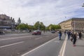 View of vehicles, people, bicycles moving on bridge across bay. View of cityscape of Stockholm. Transport concept. Sweden. Royalty Free Stock Photo