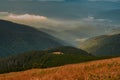 View from Velka Chochula mountain towards valley with autumn mist