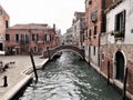 View of canal, bridge and small piazza in Venice, Italy, October