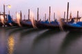 View of Venetian gondolas during sunset. Royalty Free Stock Photo