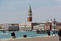 The view of Venice waterfront and St Mark`s Campanile and Doge`s Palace on a beautiful sunny day