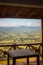 View from the veranda to the green mountains and valleys of the island of Haiti. Blue mountains, green valley. Panoramic view of