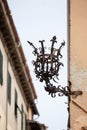 View of a very ornate wrought iron lamp enclosure