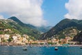 View of the vibrant town, hills and harbour of & x27;Amalfi& x27; from a boat, the Amalfi coast, Italy. Royalty Free Stock Photo