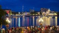 View of Victoria city Inner harbor with crowds waiting for fireworks display. Royalty Free Stock Photo