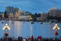 View of Victoria city Inner harbor with crowds waiting for fireworks display.