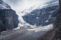 View of the Victoria glacier in the mist at the end of Plain of Six Glacier trail, Banff National Park, Alberta, Canada, on a cold Royalty Free Stock Photo