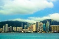 View of Victoria`s harbor from Tsim Sha Tsui TST waterfront, Hong Kong, China Royalty Free Stock Photo