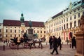 View of Vienna Hofburg Imperial Palace at courtyard with monument Kaiser Franz I and horse-