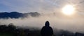 View of the village on the background of mountains. Panoramic view of foggy morning. View from the terrace.