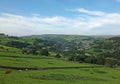 View of the village of cragg vale in the calder valley surrounded by trees and fields Royalty Free Stock Photo