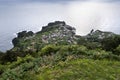 View on the village of FajÃÂ£ do Ouvidor, a permanent debris field, built from the collapsing cliffs on the northern coast of the Royalty Free Stock Photo