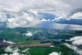 View of the village near the river from the height of a flying plane