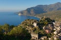 View of  the village of Nonza with its Genoese tower, Cap Corse in Corsica France Royalty Free Stock Photo