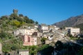 View of  the village of Nonza with its Genoese tower, Cap Corse in Corsica France Royalty Free Stock Photo