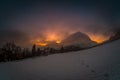 View from village Puergg to dramatic sunset over mountain Grimming Royalty Free Stock Photo