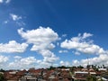 View of village residential rooftops under blue sky with sunny weather Royalty Free Stock Photo