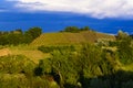 View of the vineyards and hills of Roero Piedmont Italy during a thunderstorm Royalty Free Stock Photo