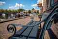 View from vintage bench over old harbor in dutch town Royalty Free Stock Photo