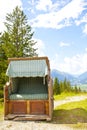 View at vintage old chair near Ehrwalder Almsee with mountain landscape, Tirol