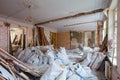 View of the vintage room with fretwork on the ceiling of the apartment and retro chandelier during under renovation, remodeling Royalty Free Stock Photo