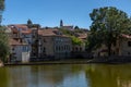 View at the Viseu city downtown, with the Paiva river , classic buildings and Cathedral of Viseu and Church of Mercy on top