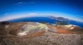 View of the volcanic crater and Lipari and Salina islands from the top of the volcano of the Vulcano island in the Aeolian islands Royalty Free Stock Photo