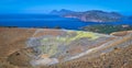 View of the volcanic crater and Lipari and Salina islands from the top of the volcano of the Vulcano island in the Aeolian islands Royalty Free Stock Photo