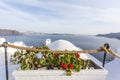 View at the volcano and the sea at Santorini island with a church in the front. - The Cyclades - Greece Royalty Free Stock Photo