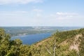 View of Volga riverbed, coastline and small town from top of the Zhiguli mountains