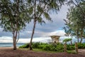 View of Waimanalo Beach and a lifeguard tower through ironwood trees on of Oahu, Hawaii Royalty Free Stock Photo