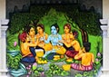 Wall art or mural of young Indian Hindu God Krishna playing with kids as in mythology