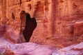 View of the wall with the door, the entrance to the temple in the canyon. Petra, Jordan.