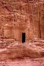 View of the wall with the door, the entrance to the temple in the canyon.