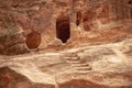 View of a wall with a man-made sandstone window. Petra, Jordan Royalty Free Stock Photo