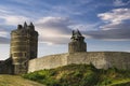 View of the wall and towers of the medieval castle of the French town of Fougeres. Royalty Free Stock Photo