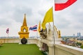 View from Wat Saket temple in Bangkok, Thailand. Detail of flags on top of Golden Mount. Thailand national flag with buddhism flag Royalty Free Stock Photo