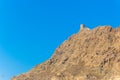 View of a watch tower on a hill in Muscat, Oman Royalty Free Stock Photo