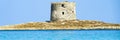 view of the watchtower from La Pelosa beach Stintino Sardinia Italy, Banner Royalty Free Stock Photo