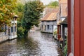 View of water canal and medieval buildings of Bruges Royalty Free Stock Photo