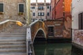 View of the water channels, bridges and old palaces in Venice at sunrise during the lockdown