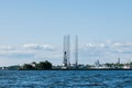 View from the water on the coastline of Kronstadt,cargo ships,Floating drilling rig,drilling cranes.Russia,Kronstadt,31